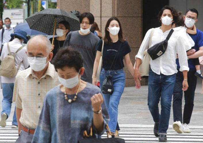 Tokyo reports record virus cases days after Olympics begin